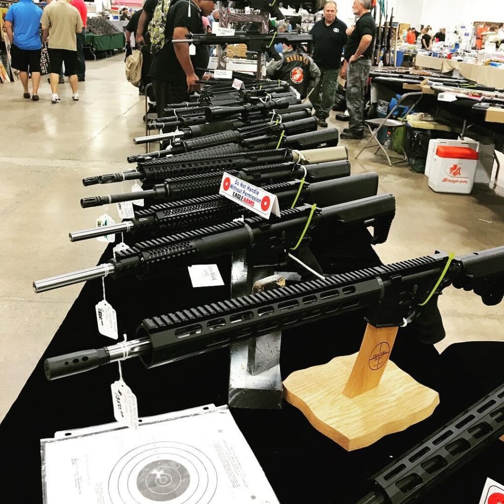 gun product display table at a gun show