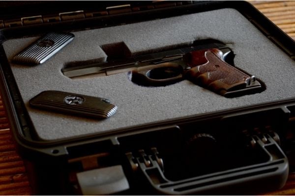weapon lockbox holding a firearm and bullets