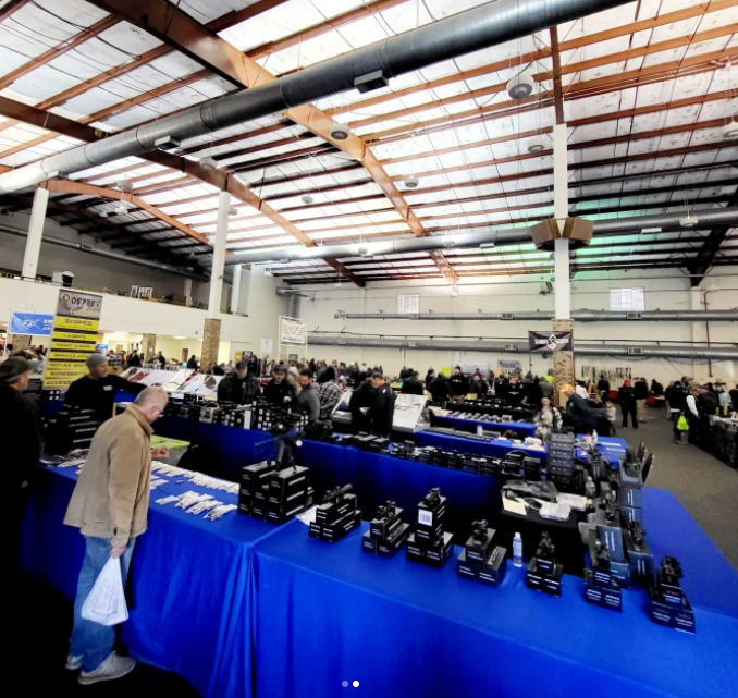 Gun Show Attendees Browsing Tables