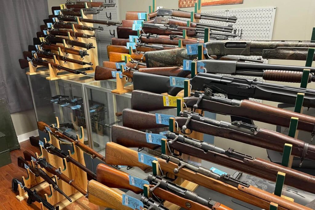 A selection of rifles on display at an Eagle Shows gun show