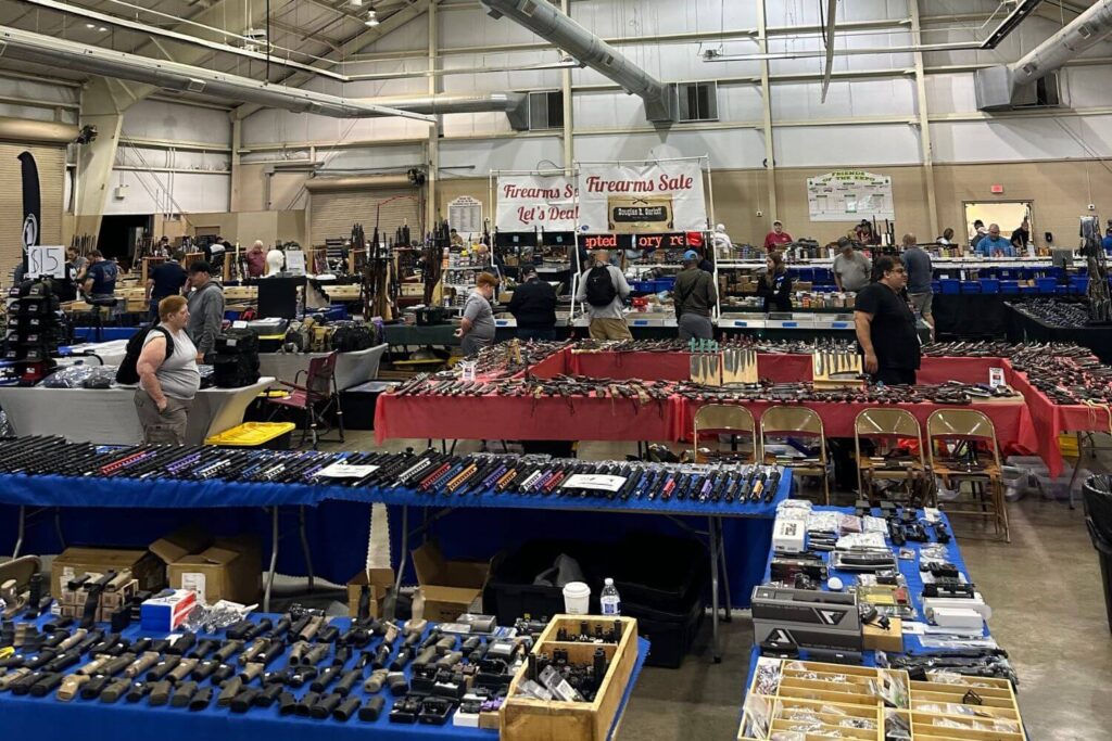 Lebanon Gun Show vendor tables set up in an expo hall