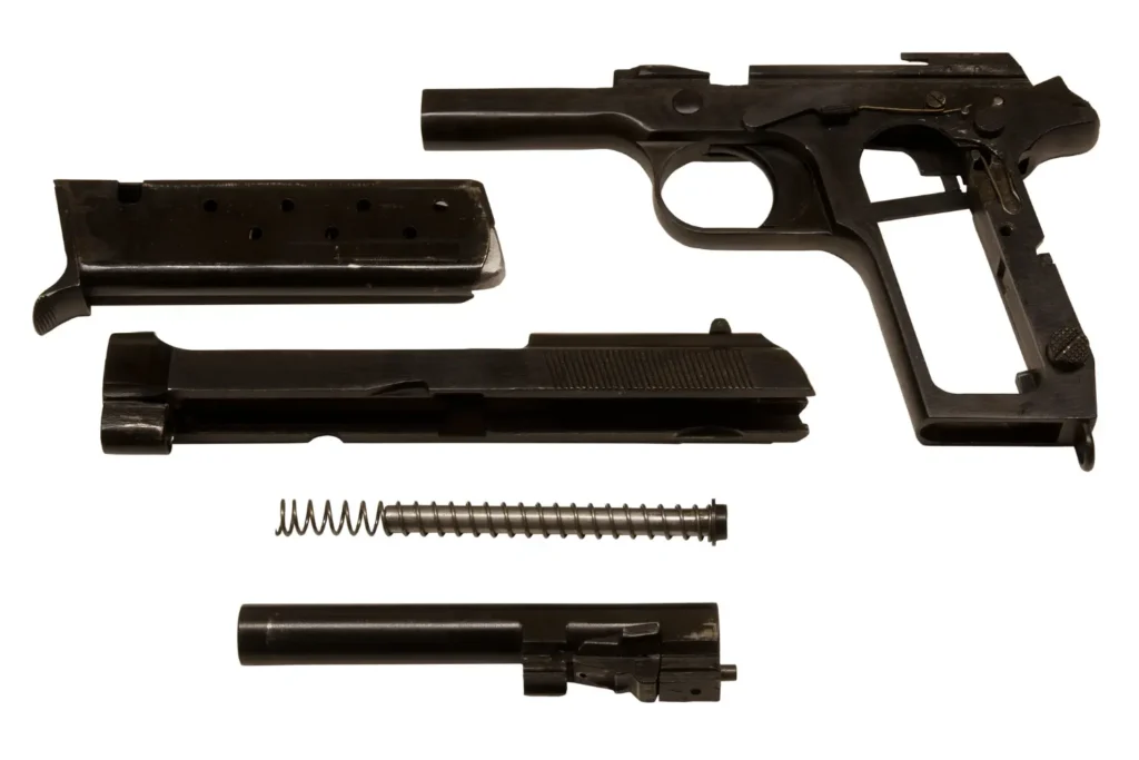 Various parts of a gun laid out - Pennsylvania Gun Shows | Get Tickets For Eagle Shows Various Parts of a Gun Laid out