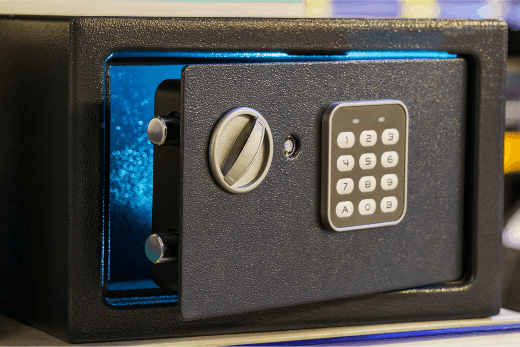 a Small Black Tabletop Safe with a Lock and Keypad