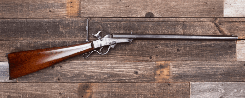 Civil War Era Rifle on a Wooden Background